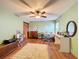 Bright home office features wood floors, built-in desk, and ample natural light at 4155 Quail Wood Dr, St Cloud, FL 34772