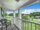 Relaxing porch with view of a green lawn and neighborhood at 4155 Quail Wood Dr, St Cloud, FL 34772
