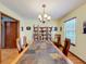 Spacious dining room with hardwood floors and decorative wall at 4155 Quail Wood Dr, Saint Cloud, FL 34772