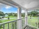 Porch overlooking a tranquil neighborhood landscape at 4155 Quail Wood Dr, St Cloud, FL 34772