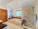 Bathroom with a large shower, soaking tub, and double vanity at 4155 Quail Wood Dr, St Cloud, FL 34772
