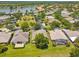 Aerial view of neighborhood with lake and houses at 196 Ventana Dr, Poinciana, FL 34759