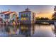 Luxury waterfront homes at sunset with canal views at 196 Ventana Dr, Poinciana, FL 34759