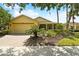 House exterior with a paved driveway at 196 Ventana Dr, Poinciana, FL 34759
