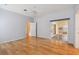 Light and airy bedroom with hardwood floors and access to a private patio at 196 Ventana Dr, Poinciana, FL 34759