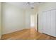 Spacious bedroom with wood floors and double closets at 196 Ventana Dr, Poinciana, FL 34759