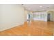 Bright living room with hardwood floors and white built-in shelving at 196 Ventana Dr, Poinciana, FL 34759