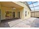 Spacious screened patio with sliding glass doors at 196 Ventana Dr, Poinciana, FL 34759