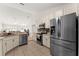 Modern kitchen with stainless steel appliances and ample counter space at 2090 Big Buck Dr, St Cloud, FL 34772