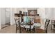 Kitchen features a casual dining area with four chairs at 2090 Big Buck Dr, St Cloud, FL 34772