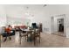 Living room with seating area and adjacent dining space at 2090 Big Buck Dr, St Cloud, FL 34772