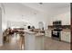 Kitchen with stainless steel appliances and breakfast bar at 2090 Big Buck Dr, St Cloud, FL 34772