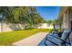 Relaxing patio with seating area in a fenced backyard at 2090 Big Buck Dr, St Cloud, FL 34772
