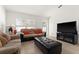 Living area features comfortable seating and large TV at 2090 Big Buck Dr, St Cloud, FL 34772
