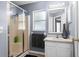 Bathroom includes a shower, vanity, and tiled floor at 2090 Big Buck Dr, St Cloud, FL 34772