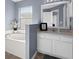 Clean bathroom with a soaking tub and vanity at 2090 Big Buck Dr, St Cloud, FL 34772