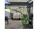 Relaxing patio area with covered gazebo, grill, and potted plants at 13155 Kegan St, Windermere, FL 34786