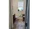 Clean bathroom with single sink vanity and tiled floor at 13155 Kegan St, Windermere, FL 34786