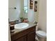 Well-lit bathroom with a single sink vanity and neutral color scheme at 13155 Kegan St, Windermere, FL 34786