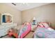 Cozy bedroom with twin beds and plenty of closet space at 350 Balboa Dr, Kissimmee, FL 34759