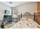 Bright bedroom with a built-in workspace and a comfortable bed at 350 Balboa Dr, Kissimmee, FL 34759