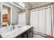 Clean bathroom with a bathtub and marble vanity at 350 Balboa Dr, Kissimmee, FL 34759
