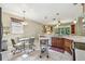 Bright kitchen with breakfast nook and island at 350 Balboa Dr, Kissimmee, FL 34759