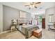 Spacious bedroom with plush bed and large windows at 350 Balboa Dr, Kissimmee, FL 34759