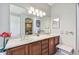 Bathroom with double vanity and large mirror at 350 Balboa Dr, Kissimmee, FL 34759