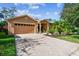 Attractive home exterior with a paved driveway at 350 Balboa Dr, Kissimmee, FL 34759