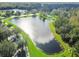 Community features a tranquil lake and lush green spaces at 350 Balboa Dr, Kissimmee, FL 34759