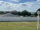 Lot with a white fence and scenic water view at 181 W Minnehaha Ave, Clermont, FL 34711