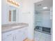 Bathroom with granite vanity and walk-in shower at 14036 Fairway Island Dr # 1515, Orlando, FL 32837