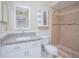Bathroom with granite vanity and shower at 14036 Fairway Island Dr # 1515, Orlando, FL 32837