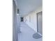 Clean and well-lit hallway with neutral colored walls at 14036 Fairway Island Dr # 1515, Orlando, FL 32837