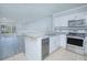 Modern kitchen with granite countertops and stainless steel appliances at 14036 Fairway Island Dr # 1515, Orlando, FL 32837