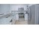 Modern kitchen with granite countertops and stainless steel appliances at 14036 Fairway Island Dr # 1515, Orlando, FL 32837