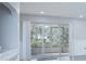 Living room with sliding glass doors leading to a screened patio at 14036 Fairway Island Dr # 1515, Orlando, FL 32837