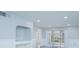 Bright living room with recessed lighting and sliding glass doors at 14036 Fairway Island Dr # 1515, Orlando, FL 32837
