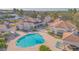 Aerial view of resort-style pool and clubhouse at 14036 Fairway Island Dr # 1515, Orlando, FL 32837