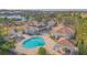 Aerial view of resort-style pool and clubhouse at 14036 Fairway Island Dr # 1515, Orlando, FL 32837
