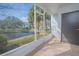 Screened porch overlooking a tranquil pond at 14036 Fairway Island Dr # 1515, Orlando, FL 32837