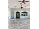 Community room with kitchen and tile flooring at 3040 Palermo Rose Way, Kissimmee, FL 34746
