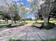 Serene community park with benches and manicured landscaping at 3040 Palermo Rose Way, Kissimmee, FL 34746