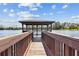 Wooden boardwalk leads to lake gazebo at 3146 Lake Jean Dr, Orlando, FL 32817