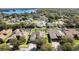 Aerial view of house and neighborhood, showcasing location and proximity to water at 3146 Lake Jean Dr, Orlando, FL 32817