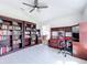 Home office with built-in bookshelves and desk, providing ample workspace at 3687 Earhart Ave, Lakeland, FL 33810