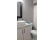 Modern bathroom with floating vanity and updated fixtures at 449 Ball Ct, Kissimmee, FL 34759