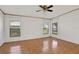 Spacious bedroom with tile flooring and multiple windows at 450 Tivoli Park Dr, Davenport, FL 33897