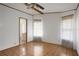 Bedroom with tile floors, large closet, and bathroom access at 450 Tivoli Park Dr, Davenport, FL 33897